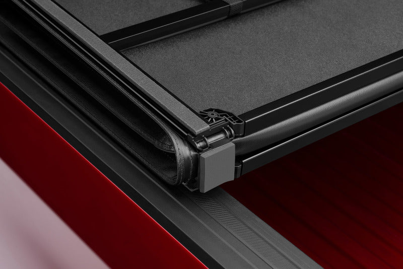 Lund 02-17 Dodge Ram 1500 Fleetside (6.4ft. Bed) Hard Fold Tonneau Cover - Black